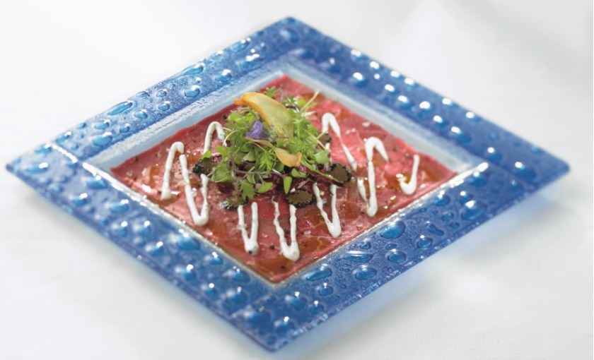 Een carpaccio van angus rund op de Celebrity Silhouette